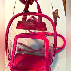 Game day ready womens clear pink backpack.